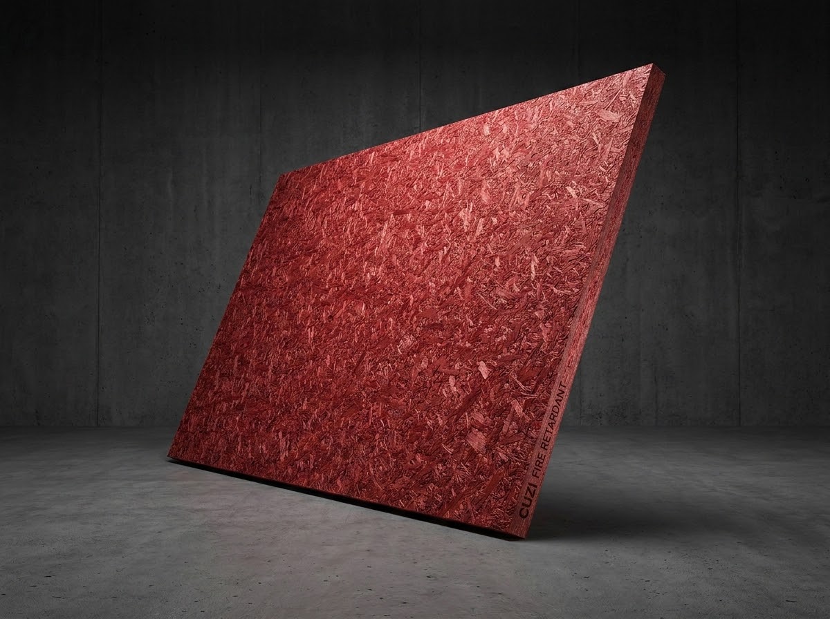 Red-core particle board panels showing the surface and cut edge